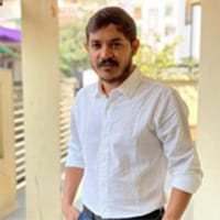 Purvesh Patel, the author of this article, is in a white shirt standing on a porch. Purvesh Patel, the author of this article, is in a white shirt standing on a porch.