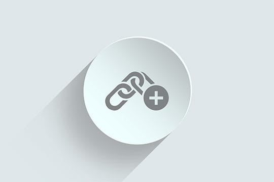 A round icon depicting a link symbol with a plus sign, indicating the option to add or create a new link. The icon has a drop shadow effect on a gray background.
