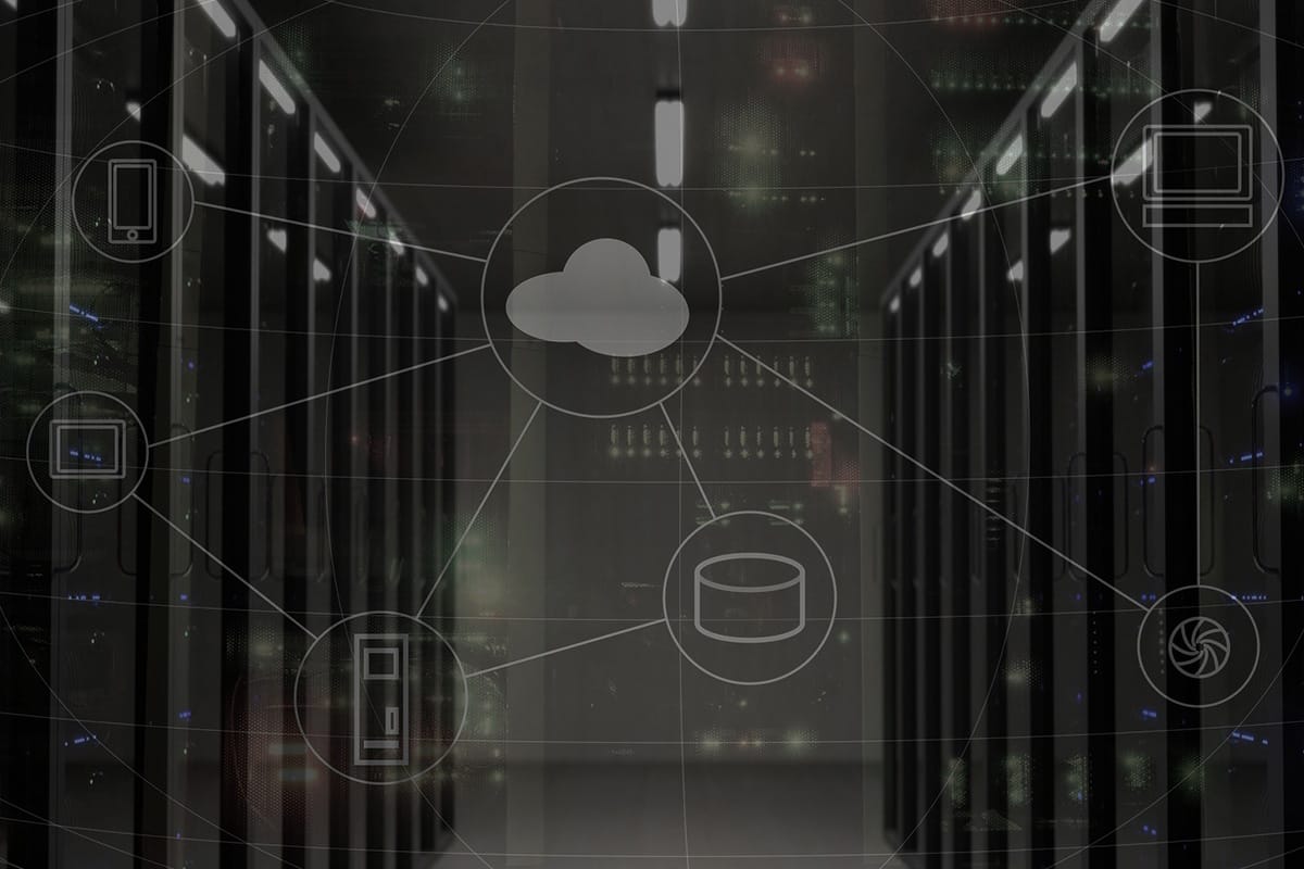 An image of a server room with a cloud connected to it.