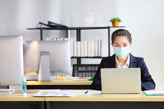 employee-mask-work-social-distance-business-office-coronavirus-covid19