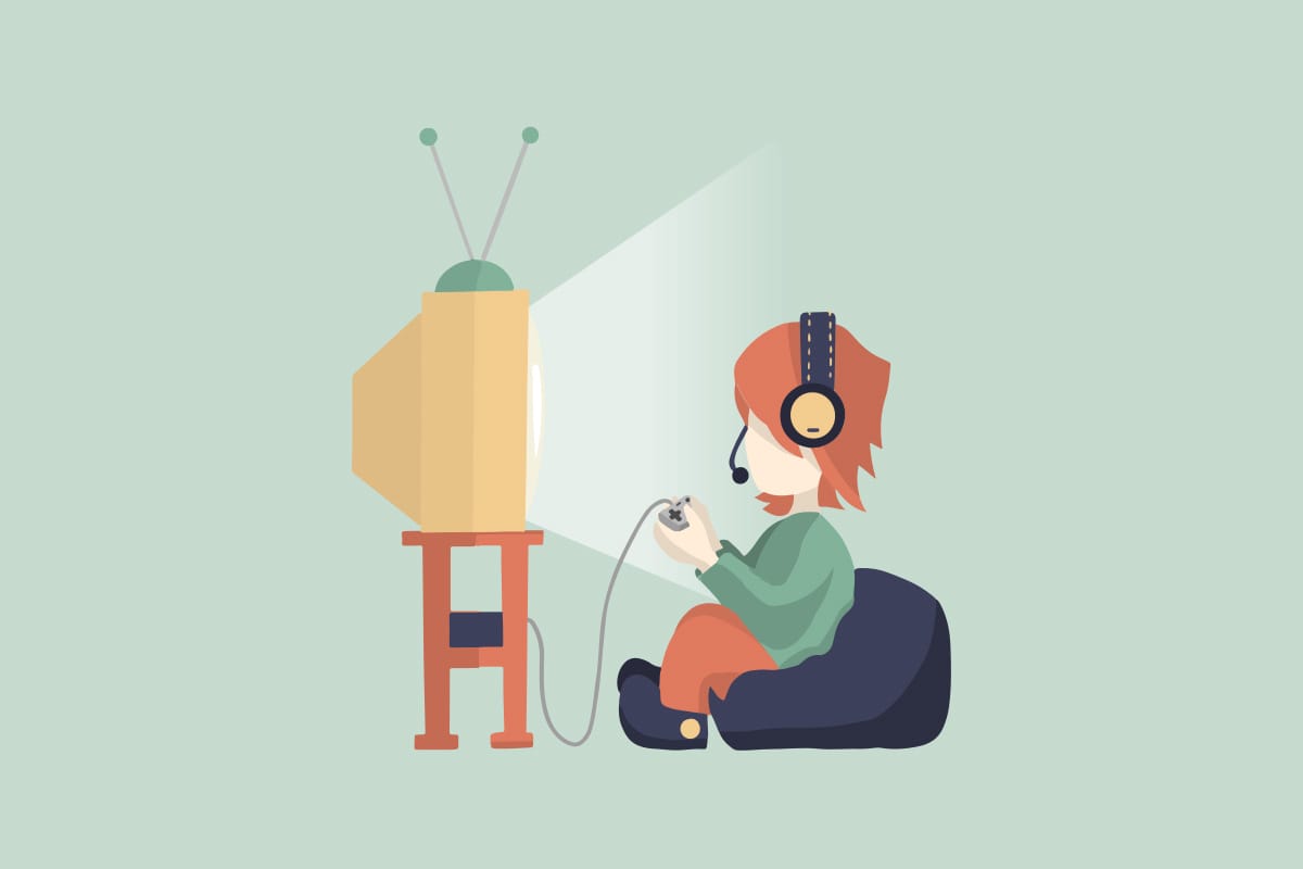 A person sits on a bean bag chair, wearing headphones and playing a video game on a retro television with antennas.