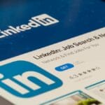 Linkedin mobile application page showing on a tablet screen with the download button and app rating visible.