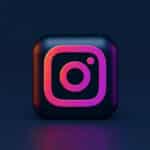 A 3D square icon with the Instagram logo in pink and orange gradient on a dark blue background.
