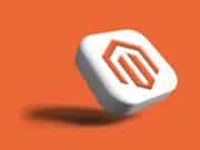 A white, rounded square button with an orange Magento logo is shown against an orange background. The button is slightly tilted and casting a shadow.