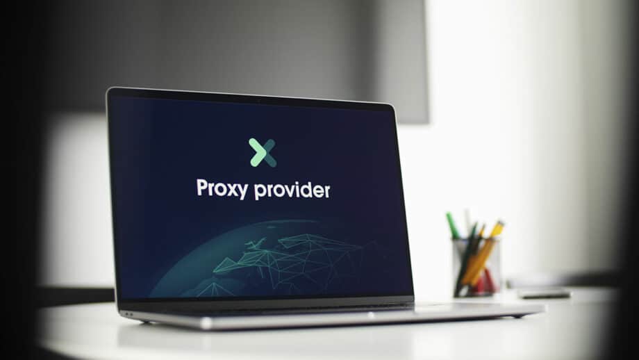 A laptop is sitting on a desk with the word proxy provider on it.