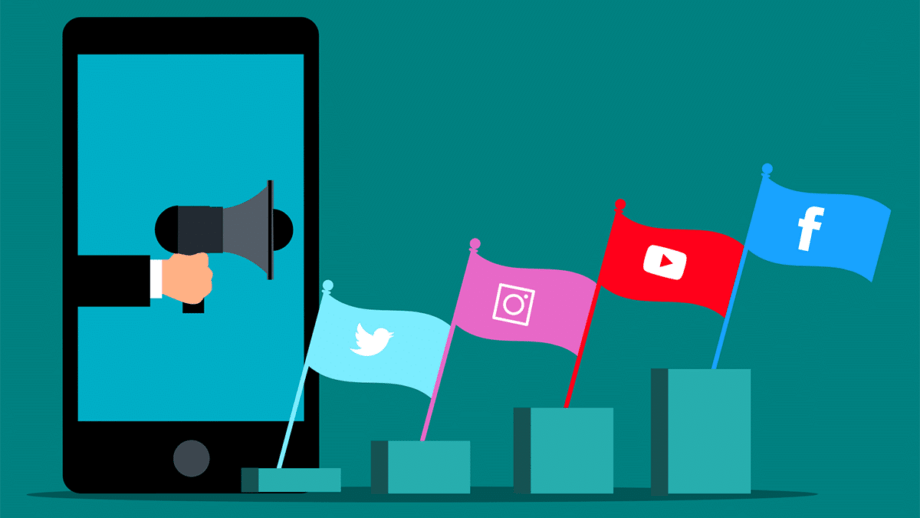 Illustration of a hand holding a megaphone emerging from a smartphone with flags of social media platforms Twitter, Instagram, YouTube, and Facebook rising on bar charts.