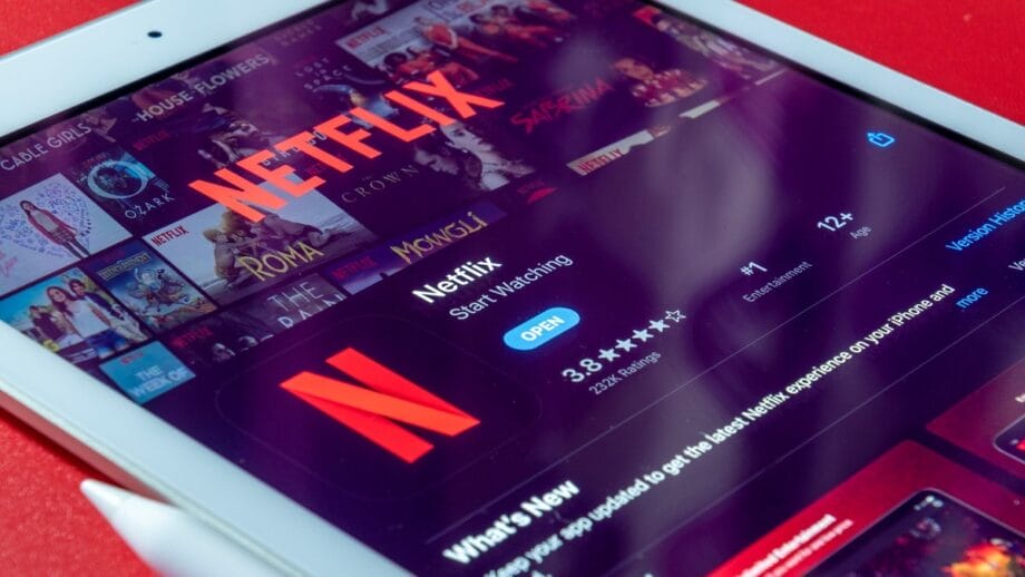 The netflix app is displayed on an ipad.
