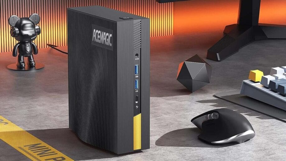 ACEMAGIC AD15 Mini PC desktop computer with a mouse and keyboard.