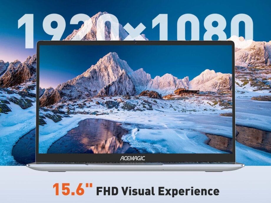 An ACEMAGIC ‎AX15 Laptop with the image of a mountain in the background.
