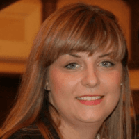 Iskra Stojanovska, the author of this article, in a black jacket, is smiling for the camera. Iskra Stojanovska, the author of this article, in a black jacket, is smiling for the camera.