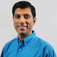 Prem Khatri, the author of this article, is in a blue shirt smiling for the camera. Prem Khatri, the author of this article, is in a blue shirt smiling for the camera.