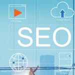 An image of a man standing in front of a projector screen with seo icons.