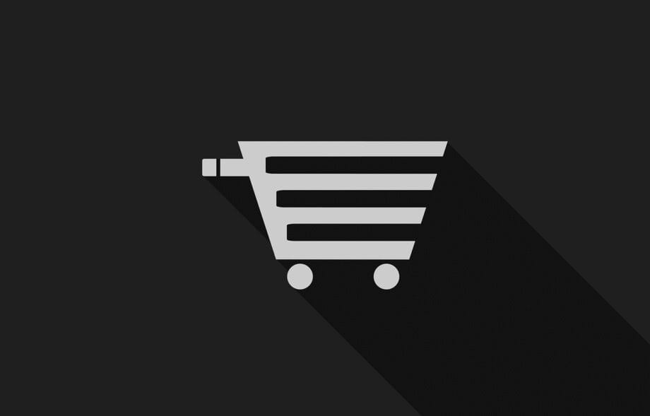 A gray shopping cart icon on a black background with a long shadow extending to the right.