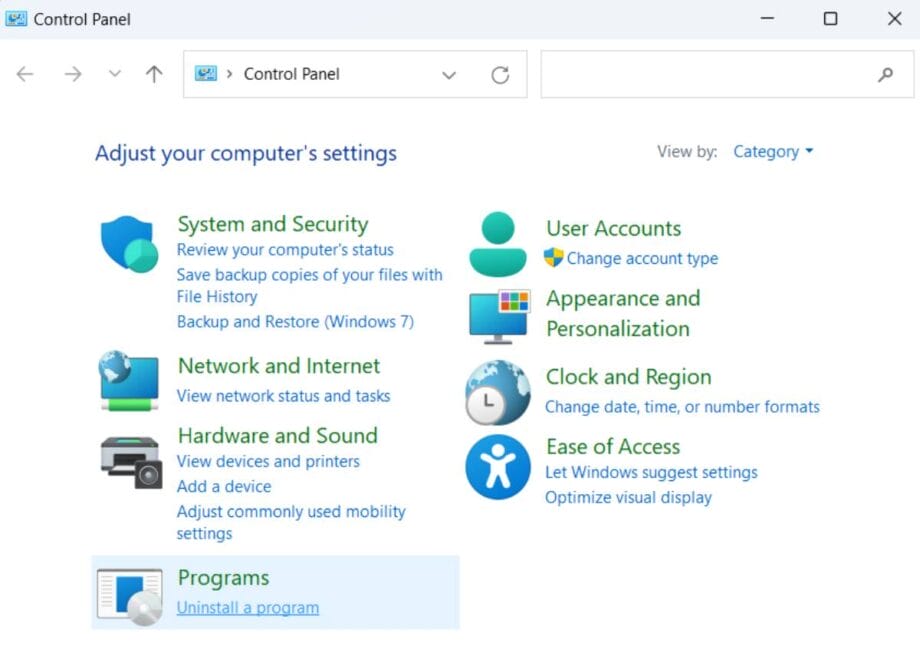 Screenshot of a Windows Control Panel displaying options for System and Security, Network and Internet, Hardware and Sound, Programs, User Accounts, Appearance, Clock, and Ease of Access.