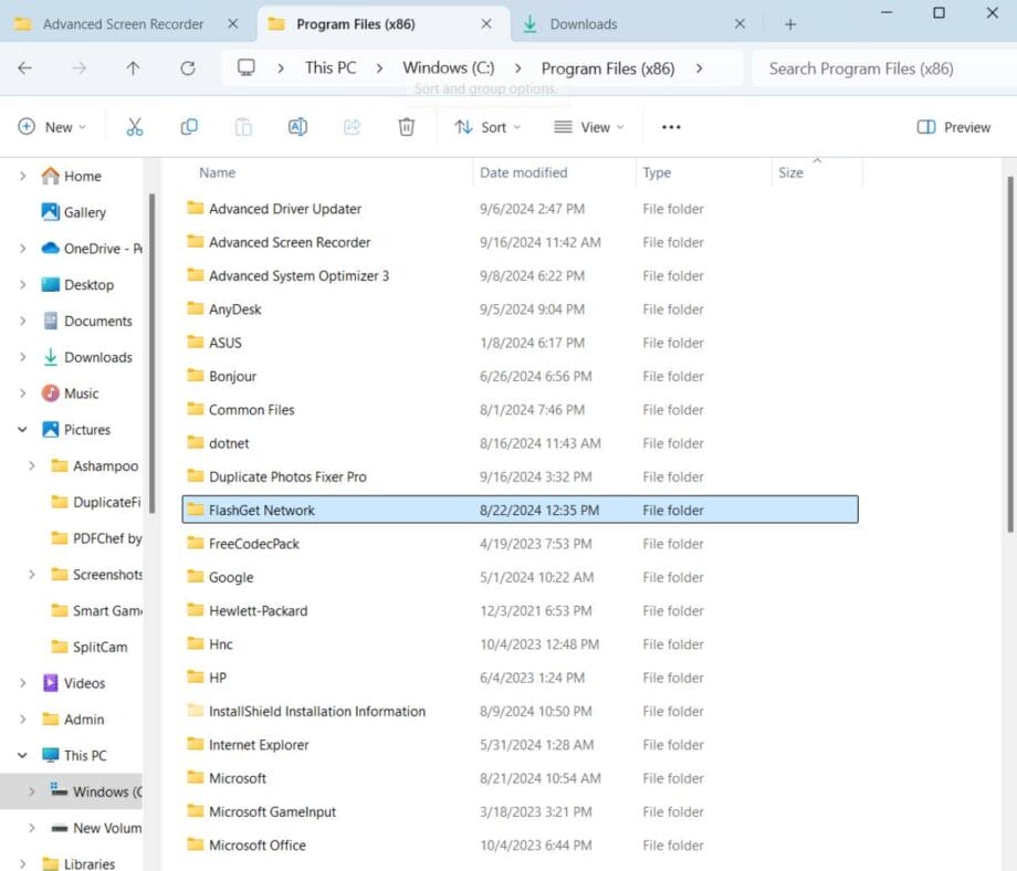 File explorer window showing contents of the Program Files directory, including folders for Advanced Driver Updater, AVG, Bonjour, FlashGet Network, and Microsoft Office, among others.