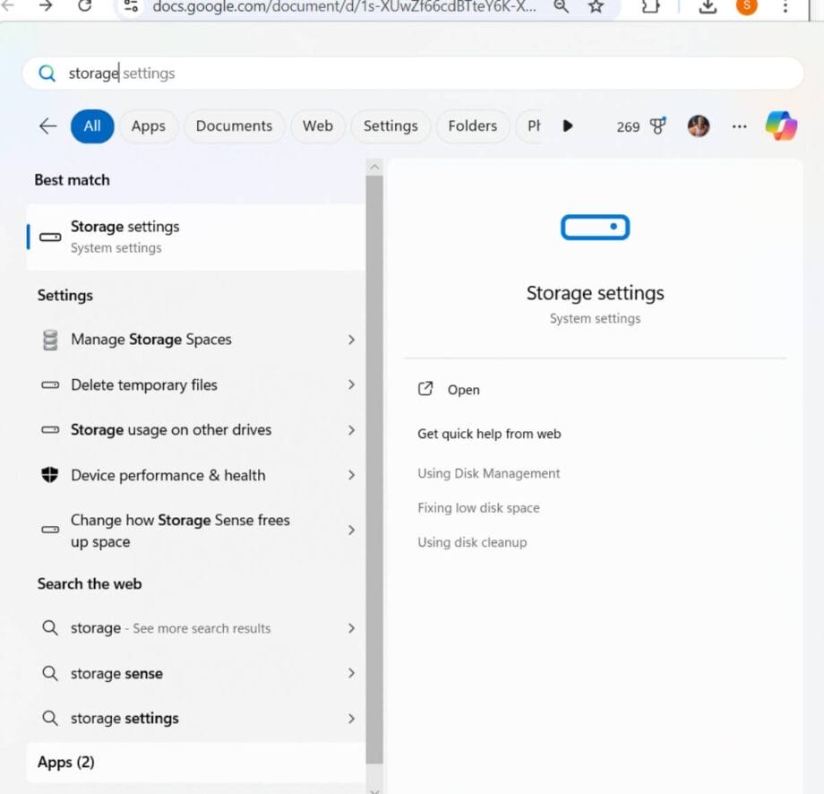 Screenshot of a computer screen showing the "Storage settings" menu, with options like Manage Storage Spaces, Delete temporary files, and Storage usage on other drives.