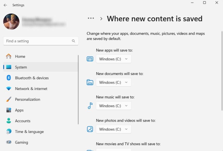 Screenshot of Windows settings showing where new apps, documents, music, and media content are saved, all set to Windows (C:) drive.