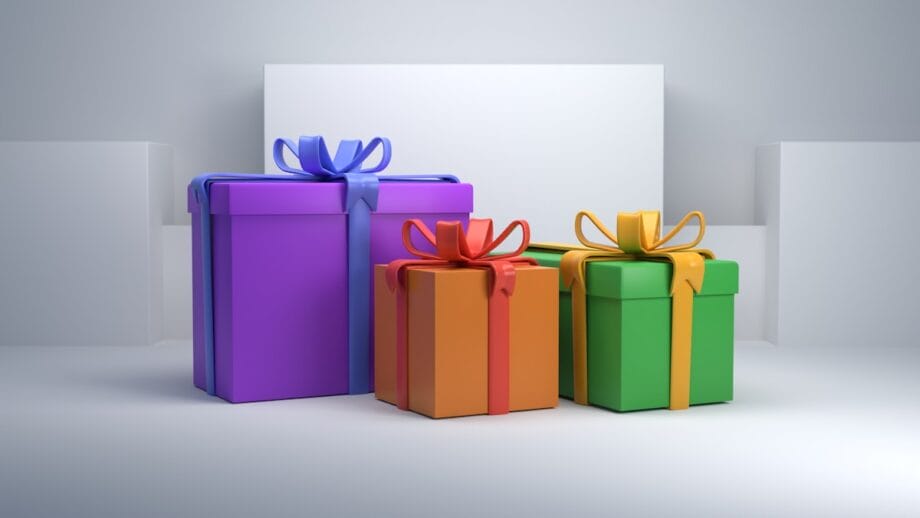 Three gift boxes with ribbons: one purple with blue ribbon, one orange with red ribbon, and one green with yellow ribbon, on a gray background.