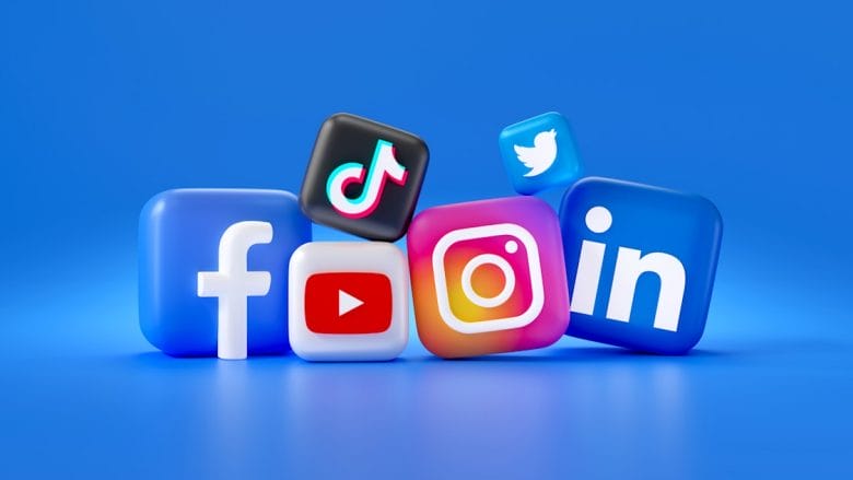 3D icons of Facebook, TikTok, Twitter, YouTube, Instagram, and LinkedIn on a blue background.