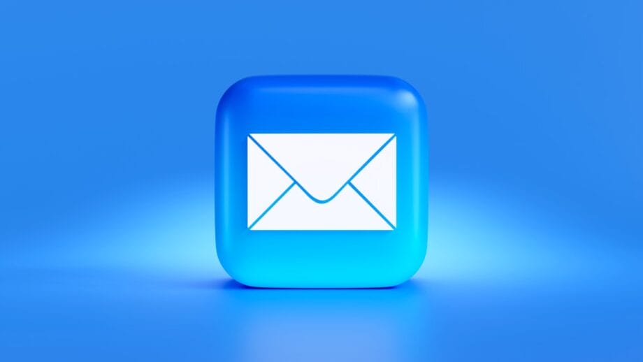 Blue 3D icon of a white envelope on a blue background, symbolizing email or messaging.