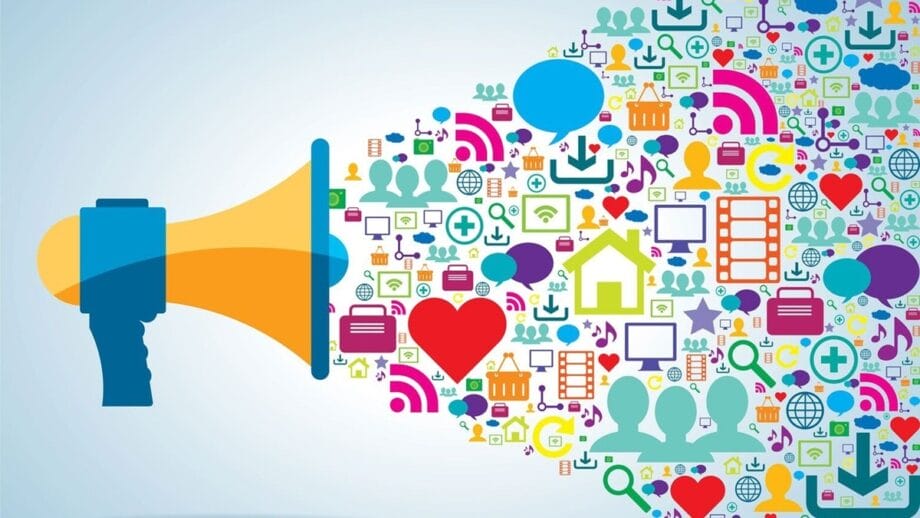 Megaphone projecting colorful icons like hearts, speech bubbles, and more, representing communication and social media concepts.
