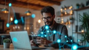 Man with glasses using smartphone and laptop in a warmly lit room, surrounded by digital network graphics.