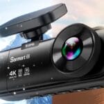 A Sarmert C3 4K 3 Channel Dash Cam with a lens and GPS feature is shown against a background split between snowy mountains and a desert.