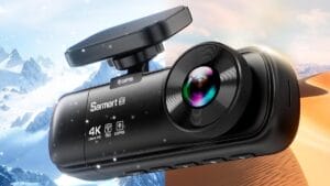 A Sarmert C3 4K 3 Channel Dash Cam with a lens and GPS feature is shown against a background split between snowy mountains and a desert.
