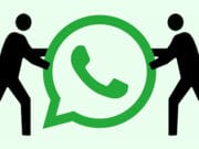 Two stick figures hold up a large WhatsApp logo between them against a light green background.