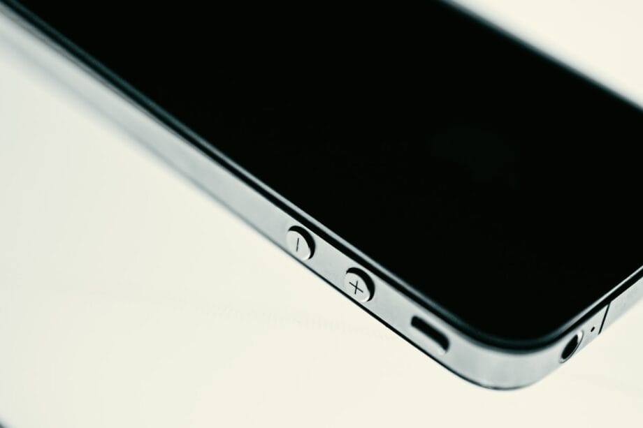 white samsung galaxy smartphone on white table