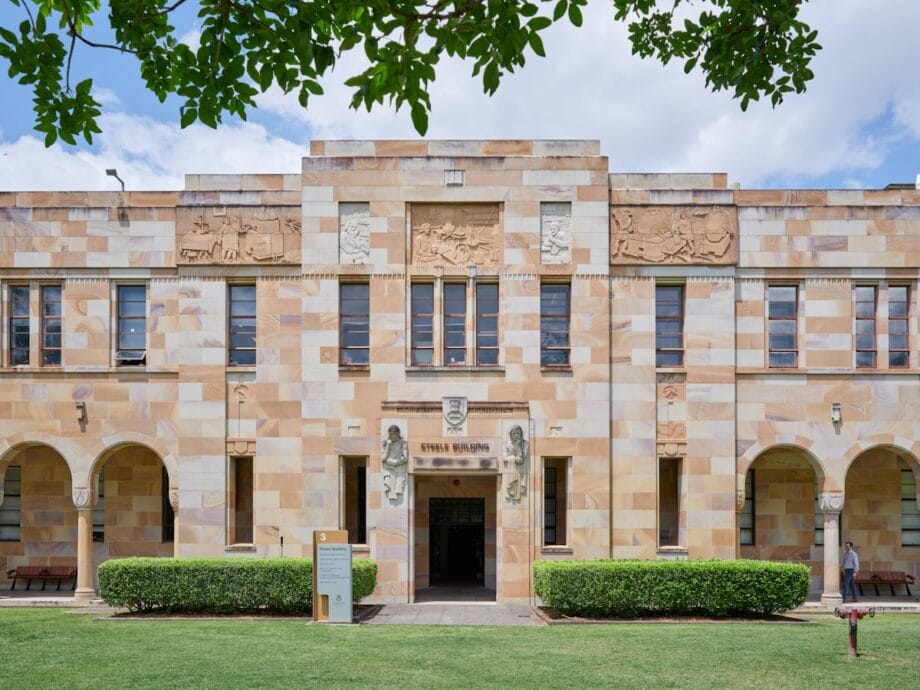 A large building with a lawn in front of it