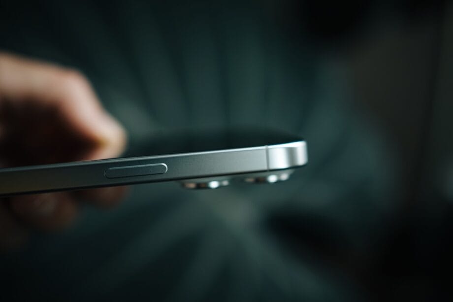 A close up of a person holding a cell phone