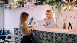woman facing on white counter