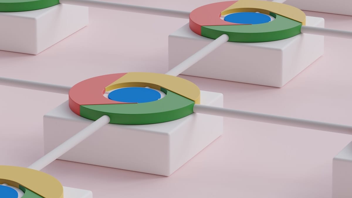 Row of 3D pie charts with Google Chrome colors, each connected by rods, placed on white blocks against a pink background.