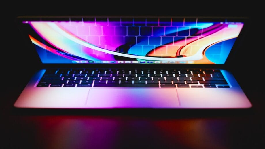 a laptop computer sitting on top of a table