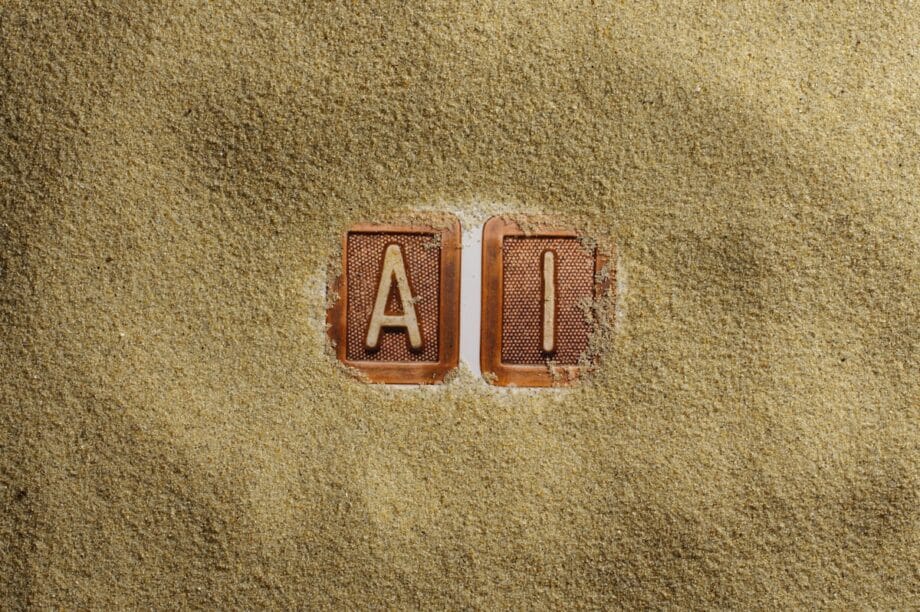 A close up of a word written in sand