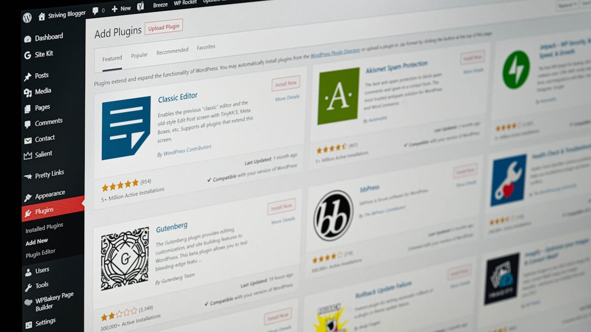 A computer screen displays the WordPress dashboard with the Add Plugins page open, showing various plugin options and ratings.