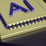 A gold computer chip with the large blue letters AI on its surface, symbolizing artificial intelligence technology.
