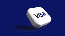 A white, rounded square with the blue VISA logo floats against a solid dark blue background.