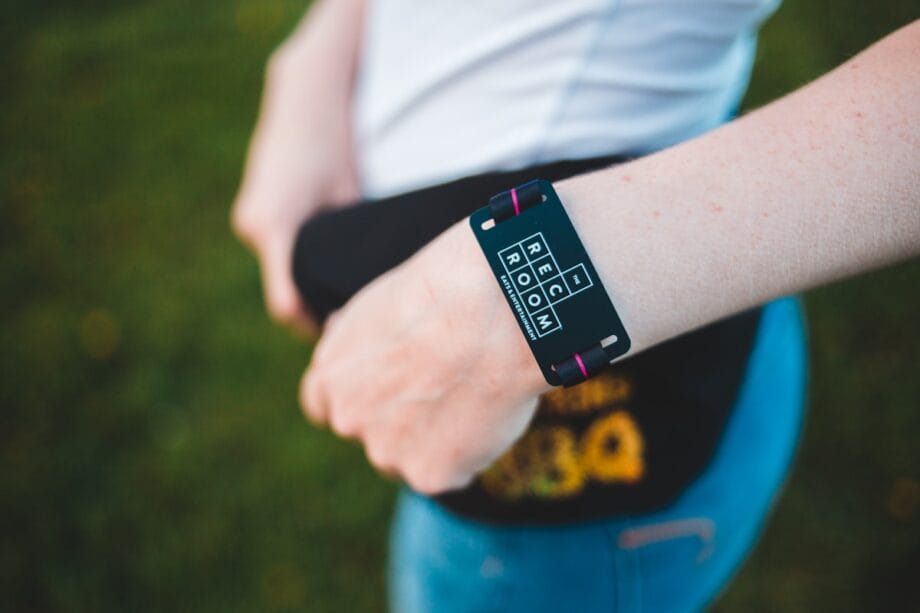 peson wearing black fitness tracker standing
