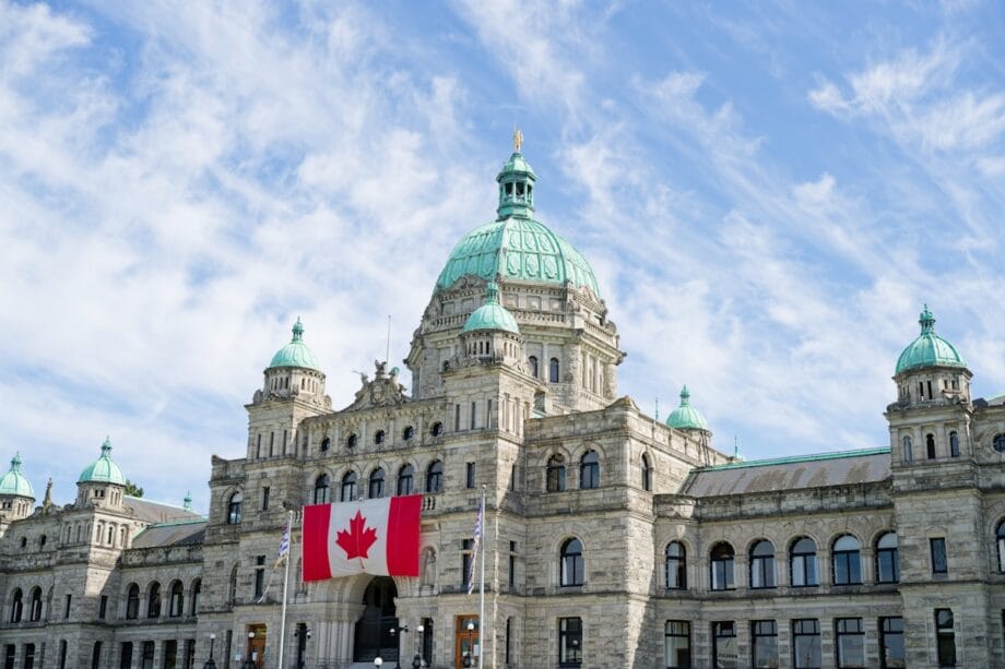The british columbia parliament buildings display the canadian flag.