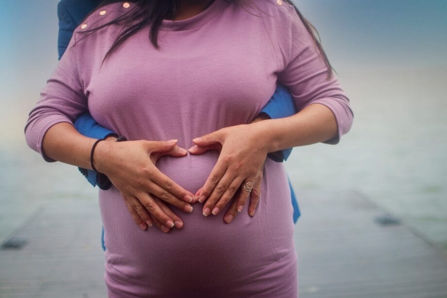 woman in purple long sleeve shirt