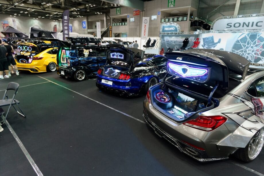 A car showroom filled with lots of cars