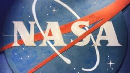 a nasa sign with the word nasa painted on it