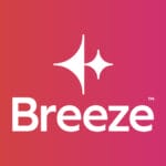 White geometric HubSpot Breeze AI logo on a pink and orange gradient background.