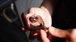 person holding black and gray device