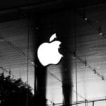 A black and white photo of an apple logo