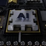 Close-up of a computer motherboard with a large central chip labeled AI Artificial Intelligence surrounded by electronic components.