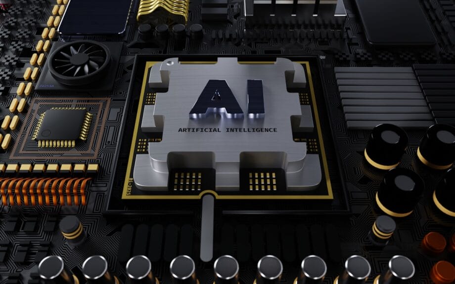 Close-up of a computer motherboard with a large central chip labeled AI Artificial Intelligence surrounded by electronic components.