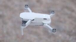 white drone on grey surface